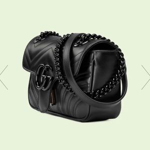 Gucci mini marmont.  Black on black.  Excellent condition.